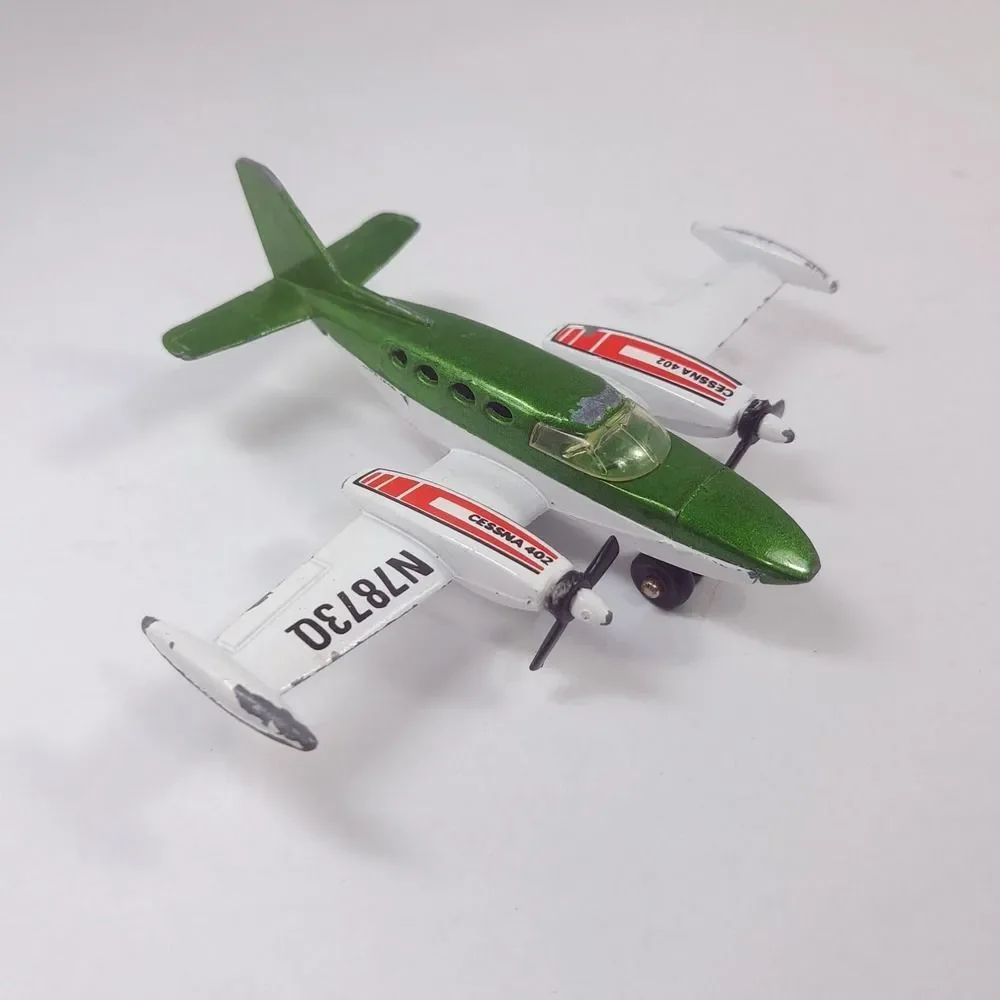 MATCHBOX Sky Busters 1974 SP9 Cessna 402 plane Airplane Macau Diecast green